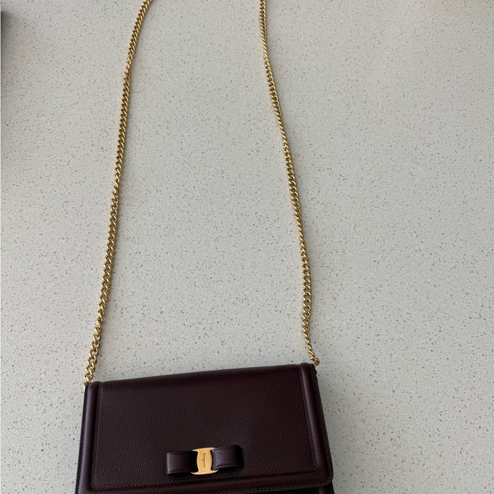 Salvatore Ferragamo
Vara Bow Burgundy Leather Chain Flap Bag